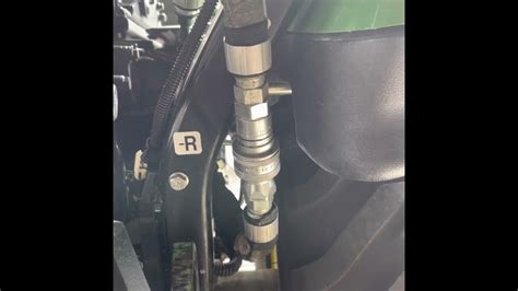For the <b>1025r</b>, you'll need a bungee cord to keep the arms together when nothing is attached to them. . John deere 1025r 3 point hitch won t stay up